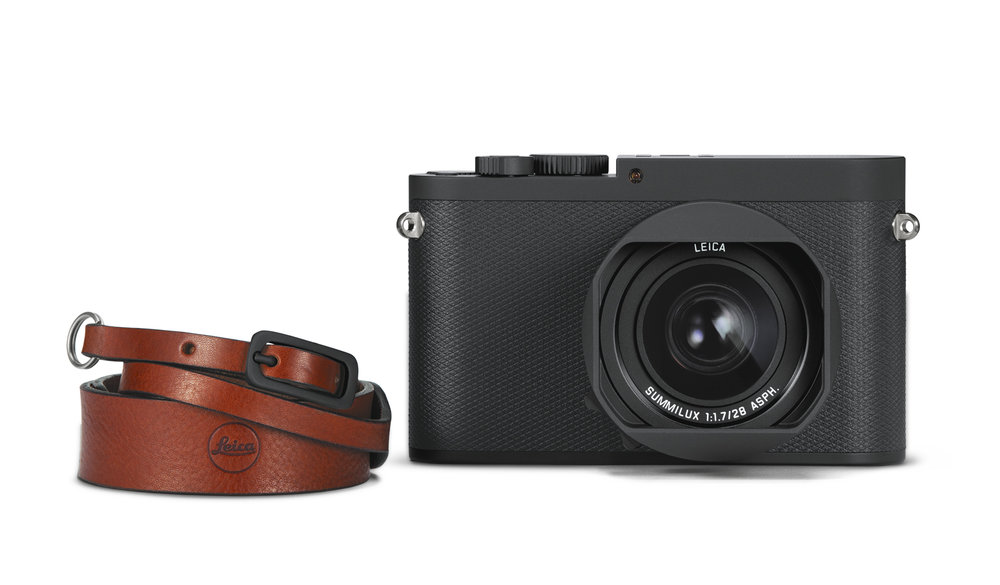The Q-P comes with a very attractive leather strap and a spare battery